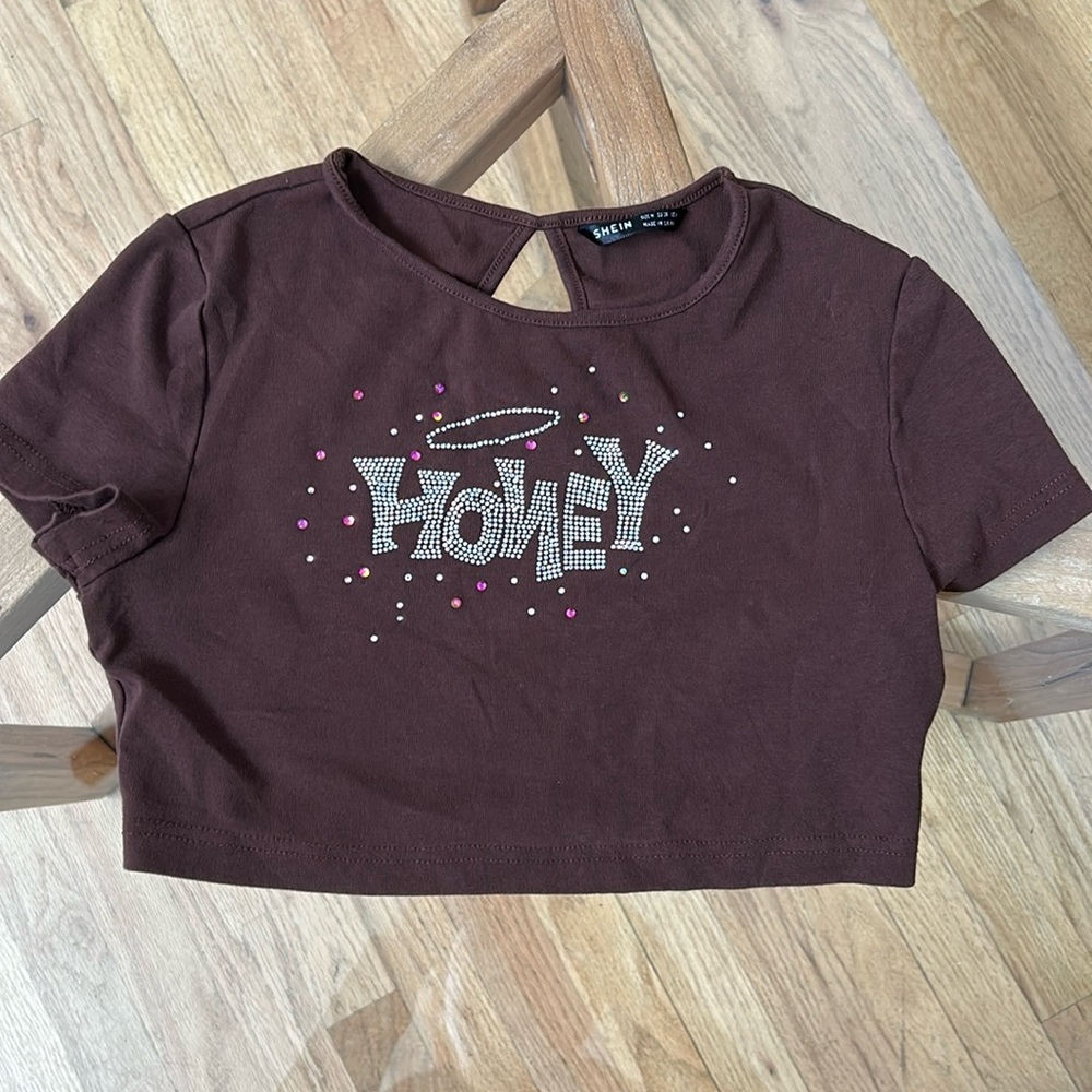 Medium brown crop top with “HONEY” graphic in gems